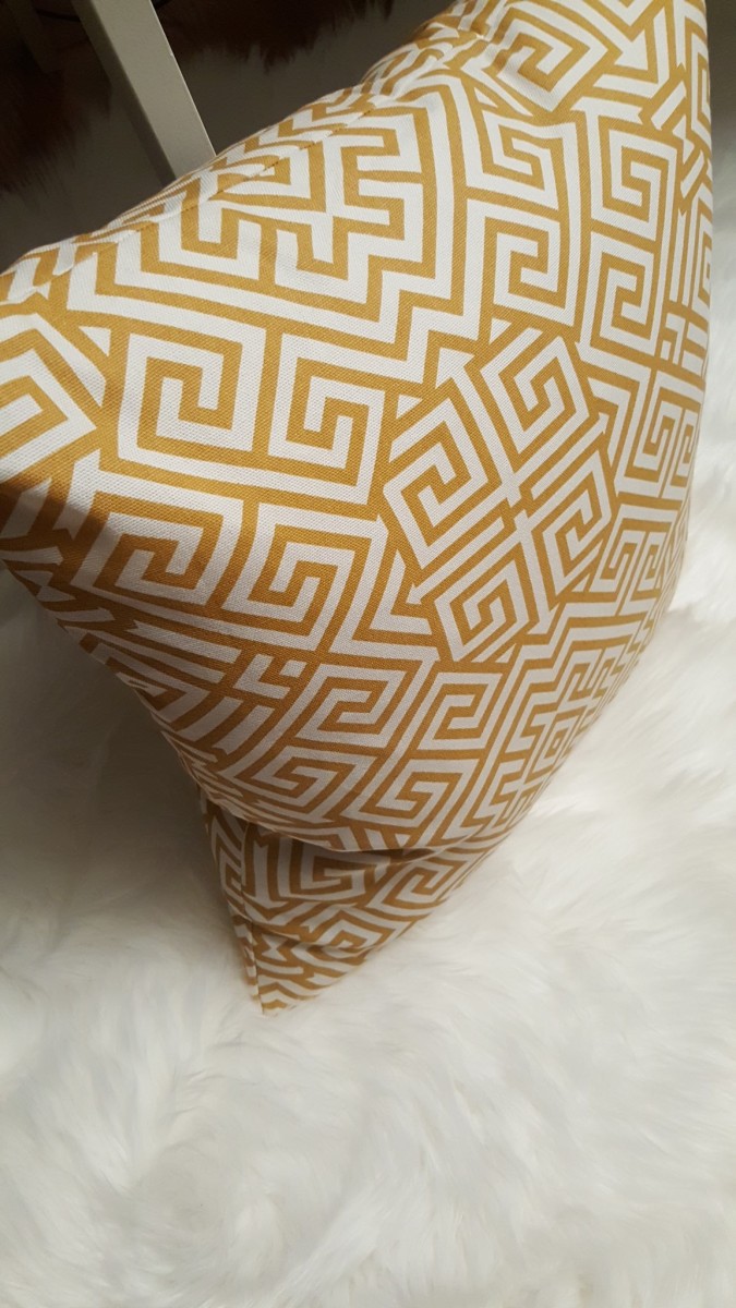 yellow geometric pillow